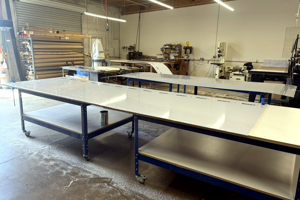 Oversize white polycarbonate sheets cut to size for a local sign shop