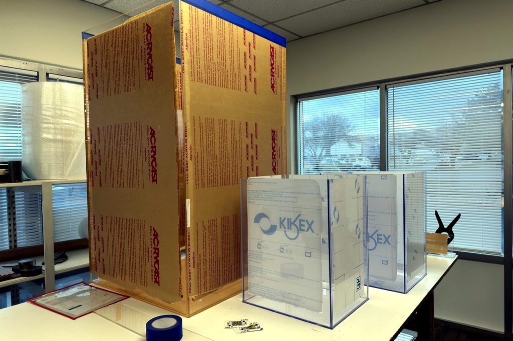 Large custom acrylic case and clear acrylic bins