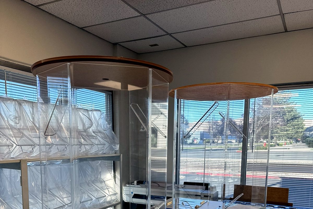 Cylindrical clear acrylic display towers fabricated in Sparks, NV