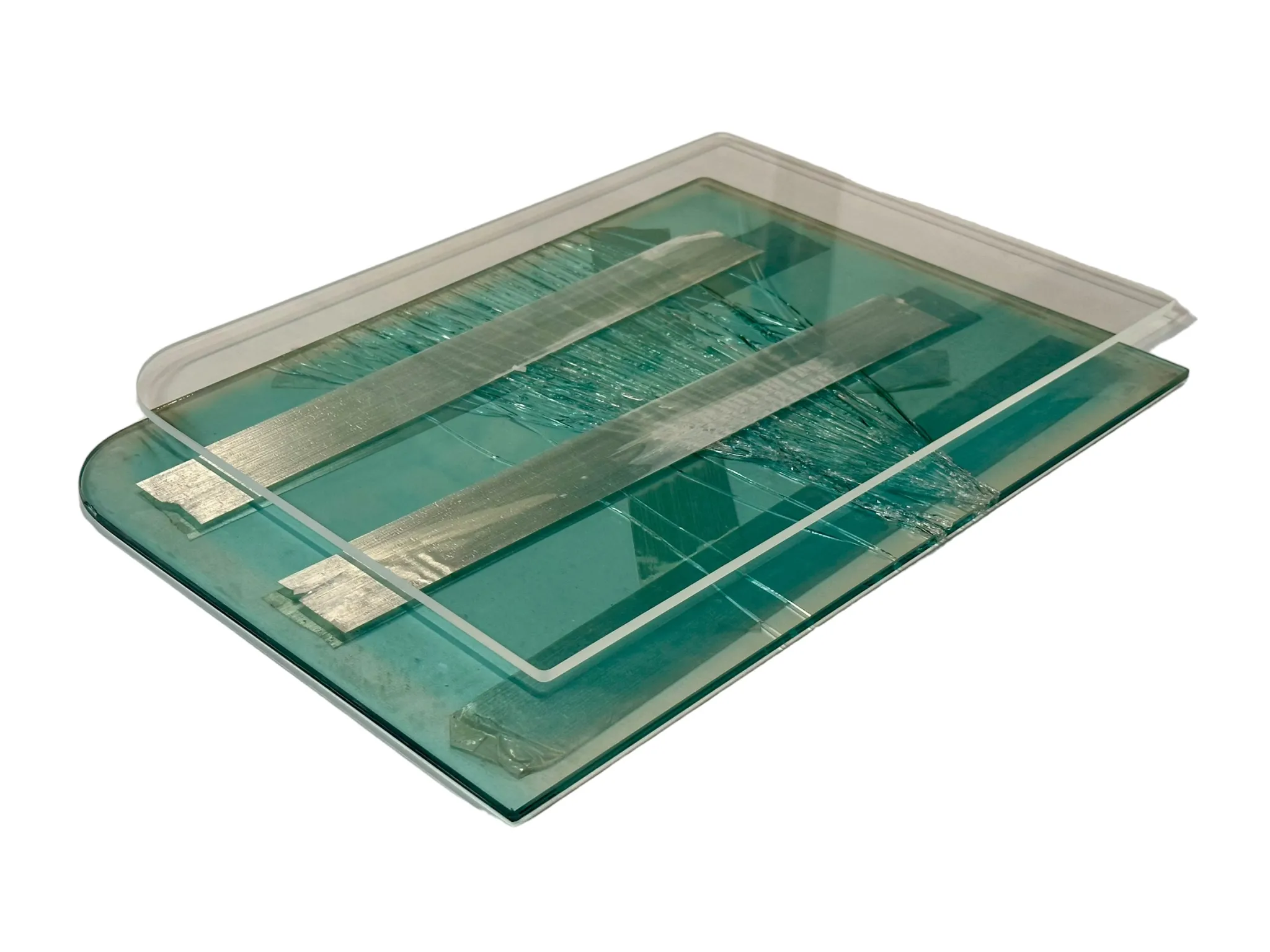 Damaged tempered glass panel with tape repair